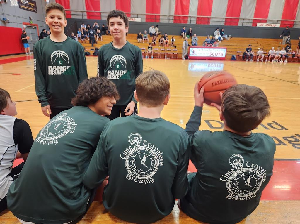 Sponsor logos on team warm-up shirts